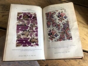 A double page spread taken from the Journal of Design No. 25, March 1, 1851, Vol. V, featuring the Balzarine sample, printed by Inglis and Wakefield and featured under “PRINTED FABRICS” in the Great Exhibition. This pattern, dyed with their new patent ‘dahlia colour’, is a vivid example of the era’s design innovation.